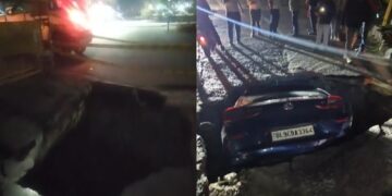 दिल्ली: ड्वार्क में सड़क गुफाओं के हिस्से के बाद कार गड्ढे में गिरती है, एएपी नेता बीजेपी में एक जिब लेता है वीडियो