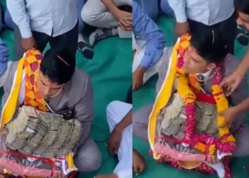 दुल्हन दूल्हे वायरल वीडियो: दूल्हे की गोद में कैश ऑफ कैश सोशल मीडिया हलचल पैदा करता है, नेटिज़ेन कहते हैं 'खरेद लीया'