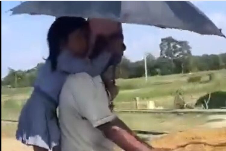 वायरल वीडियो: दिल स्पर्श! बेटी ने पिता को झुलसाने के लिए उसे स्कूल जाने के लिए साइकिल चलाया