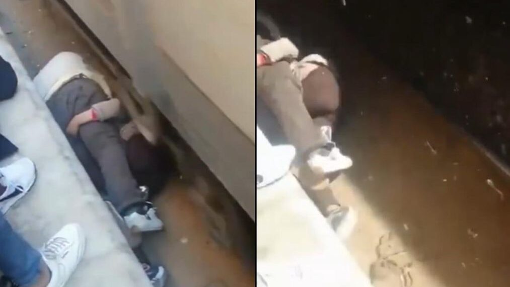 वायरल वीडियो: बहादुर डैड ने स्पीडिंग ट्रेन से बेटी को ढाल दिया, एक वास्तविक जीवन सुपरहीरो पल!