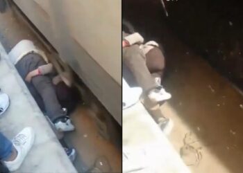 वायरल वीडियो: बहादुर डैड ने स्पीडिंग ट्रेन से बेटी को ढाल दिया, एक वास्तविक जीवन सुपरहीरो पल!