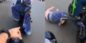 वायरल वीडियो: महिला पिलियन राइडर मोटर साइकिल चालक की चेतावनी का पालन करने में विफल रहता है, सड़क पर फ्लैट होता है