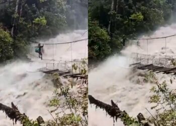 वायरल वीडियो: वास्तविक जीवन में खत्रो का खिलडी! आदमी अरुणाचल प्रदेश में रिवर रेज के रूप में लटका हुआ पुल पार करता है