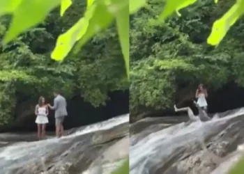 वायरल वीडियो: बॉयफ्रेंड ने झरने पर प्रेमिका को प्रस्तावित किया, धारा में बह गया, प्रेमिका मूक दर्शक